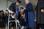 Robotic Exoskeleton Helps Paraplegic Student Walk