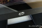 HP Q3 earnings cite restructuring for stifled income