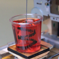 3D printer made from CD-ROM drives makes ink designs in Jello