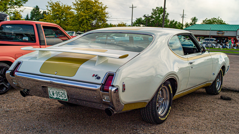 White and Gold 1969 Hurst/Oldsmobile seen from right rear view