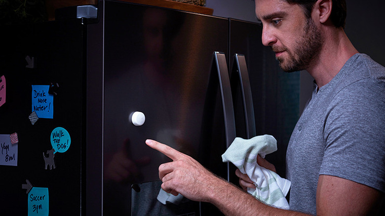 Philips Hue Smart Button on a fridge