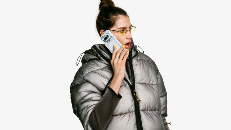 A girl using the Nothing Phone 4a