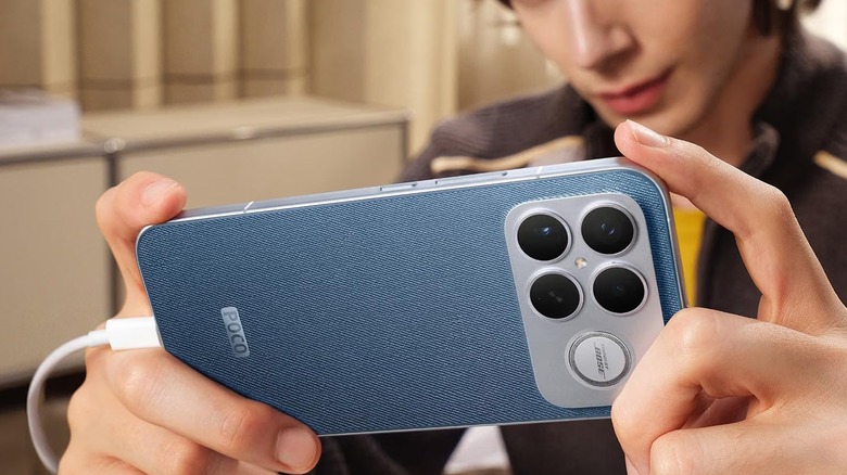 Person holding a Denim Blue Poco F8 Ultra