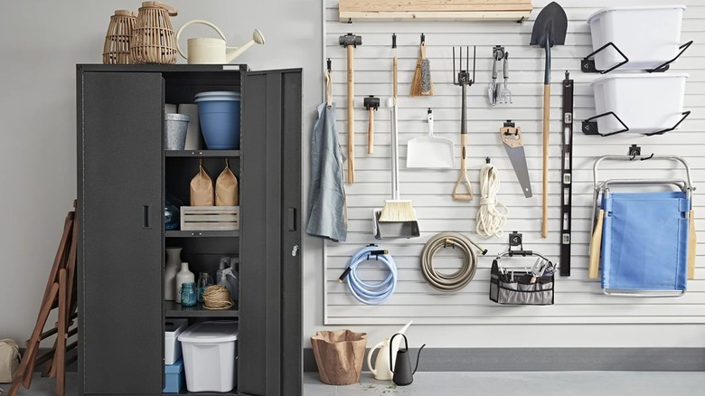 Gladiator Garageworks tool organizer racks and cabinets set up against a garage wall