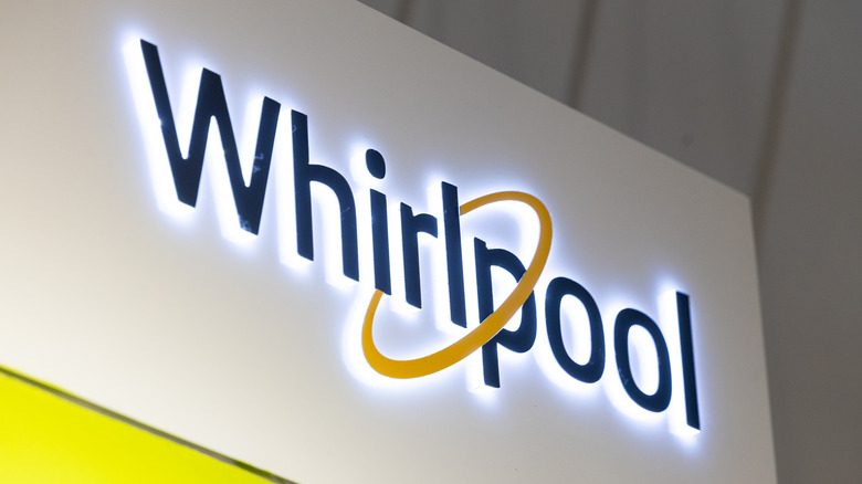 Whirlpool sign glowing at an exhibition in Bucharest, Romania
