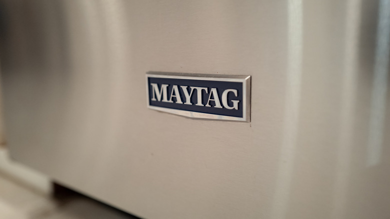Close up of a Maytag logo on an appliance