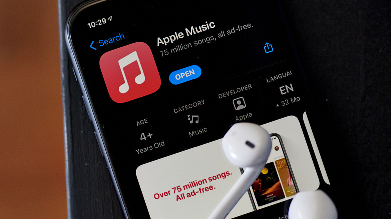 Apple Music on App Store with earbuds