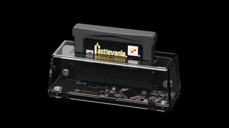 A Game Boy Advanced cartridge reader with a "Castlevania" game inside on display