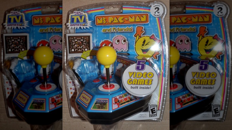 A Ms. Pac-Man plug-and-play console inside plastic packaging