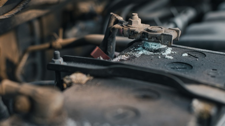 Close up of corroded car battery