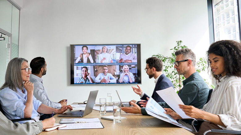 Office workers on a conference call