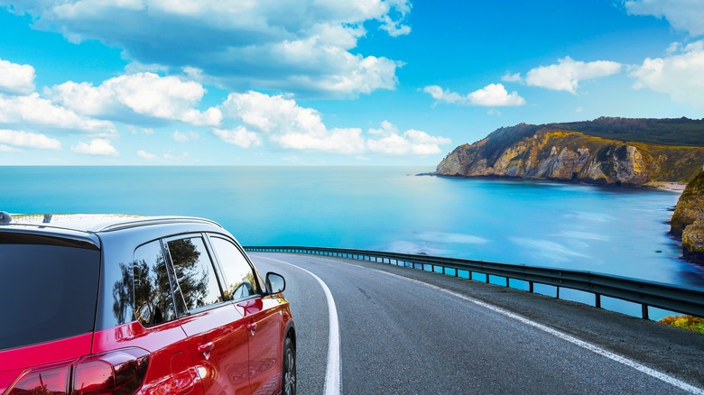 Car driving on coastal road