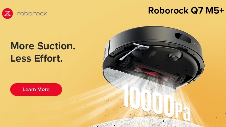 Roborock black Q7 M5+ on yellow background that reads "More Suction. Less Effort."