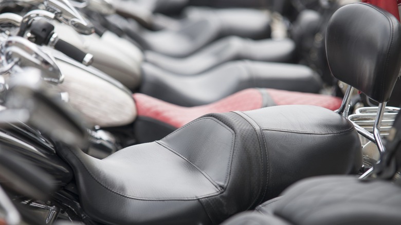 a parked motorcycle with a custom seat