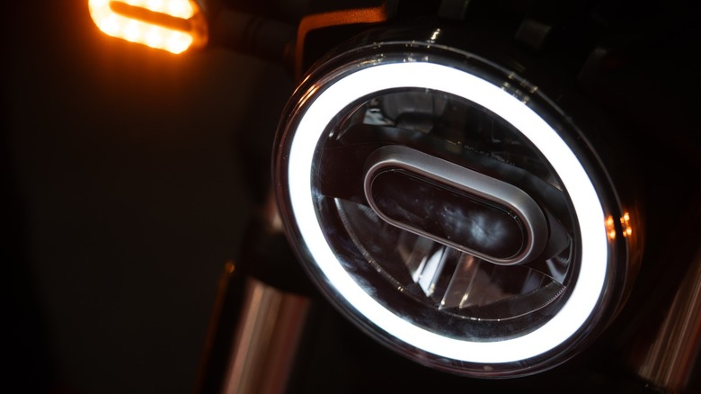 a custom LED headlight installed on a motorcycle