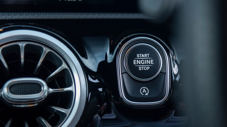 A vehicle's auto start stop button on the dashboard
