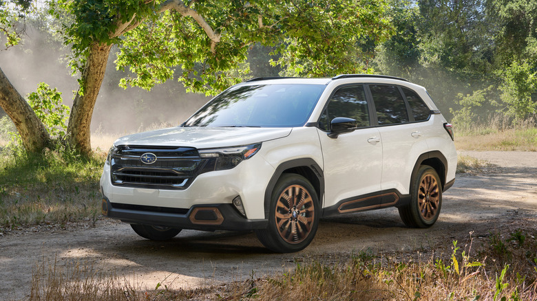 A side on shot of a 2026 Subaru Forester driving