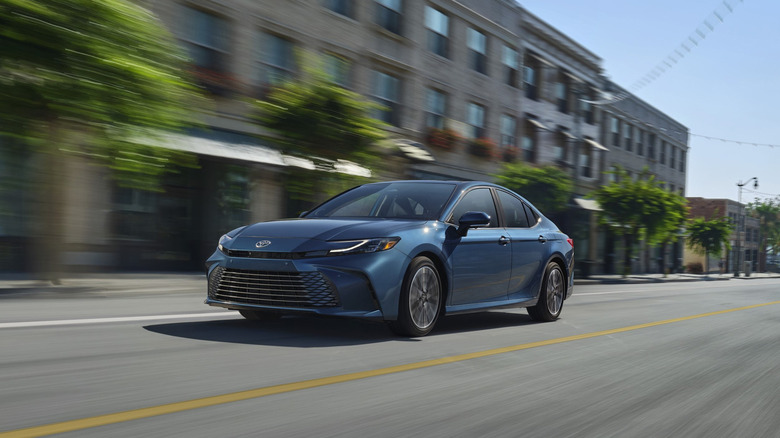 A side on shot of a 2026 Toyota Camry driving