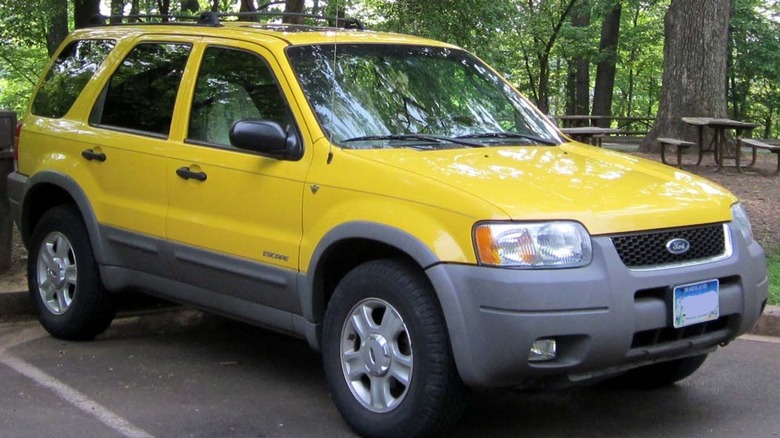 Yellow Ford Escape in parking lot