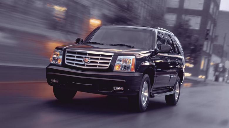 A front end shot of a black 2002 Cadillac Escalade