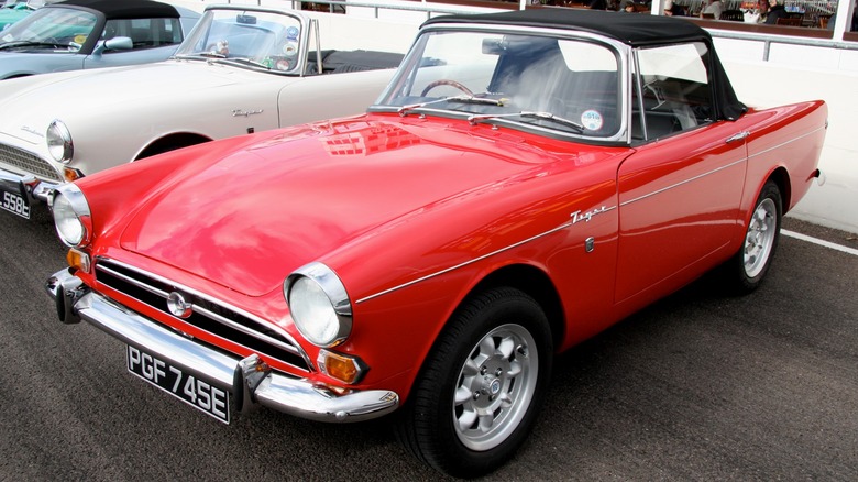 Red Sunbeam Tiger parked at a car show