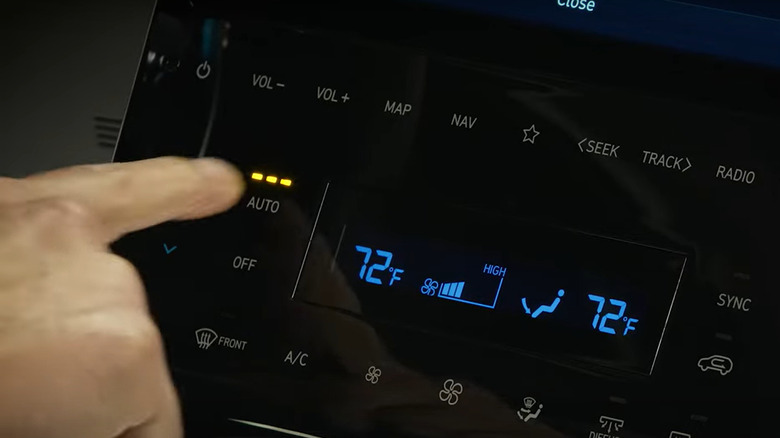 Auto climate control button in a Hyundai