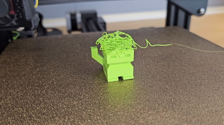 A 3D print suffering from spaghetti.