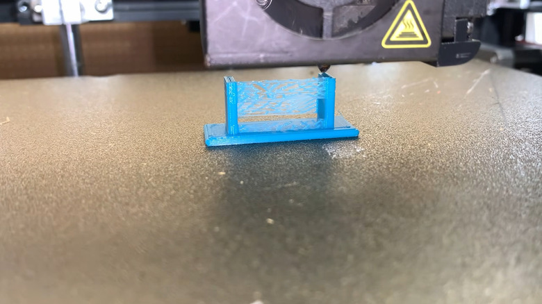 A 3D print suffering from stringing.