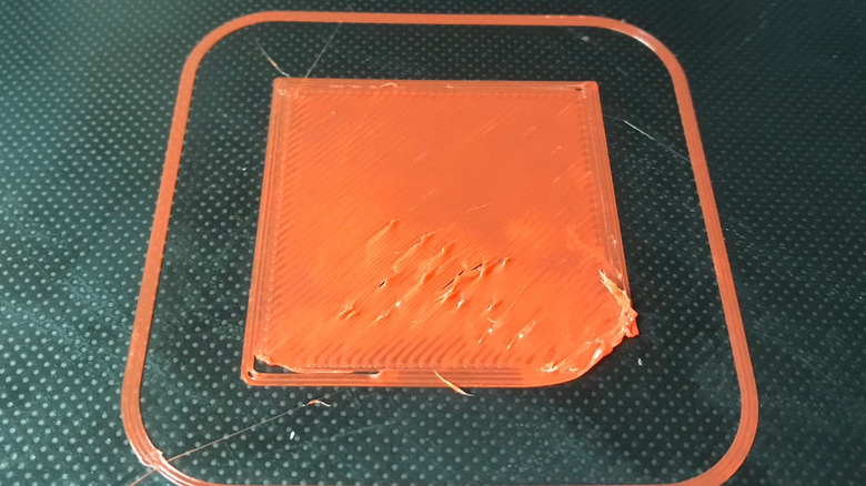 And improperly adhered first layer on a 3D printer.