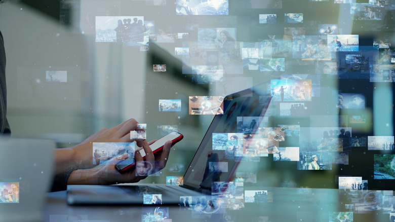 A person uploading media files 