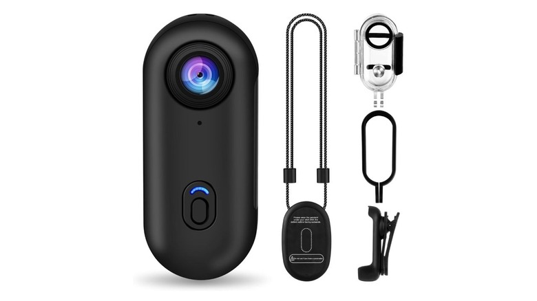 A picture of the i3 4K Thumb Action Camera on a white background with some accessories