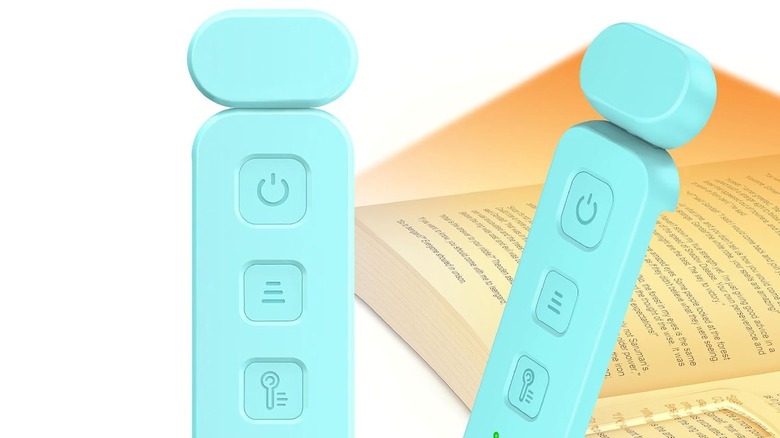 The blue Gritin Reading Light on a white background and an example of the light directed towards an open book