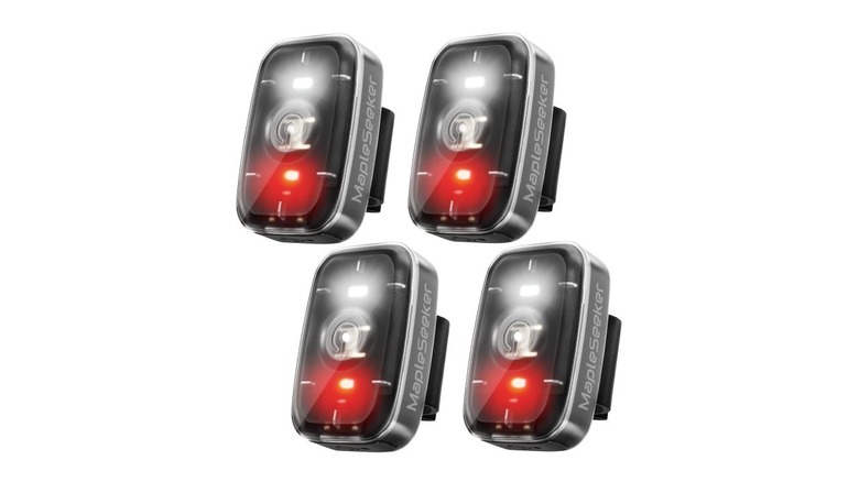 Four safety lights from MapleSeeker on a white background, each with red and white lights
