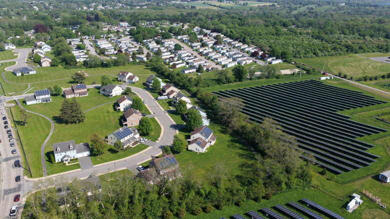 Aerial view of solar farm beside a residential neighborhood in Portsmouth, Rhode Island.