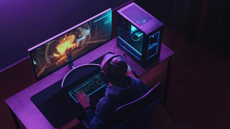 A gamer playing games on his PC