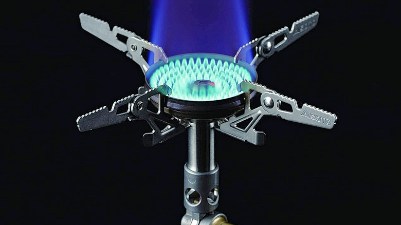 The blue flame of the SOTO Windmaster Stove.