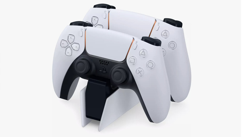 Two Playstation DualSense controllers docked in the Playstation charging station