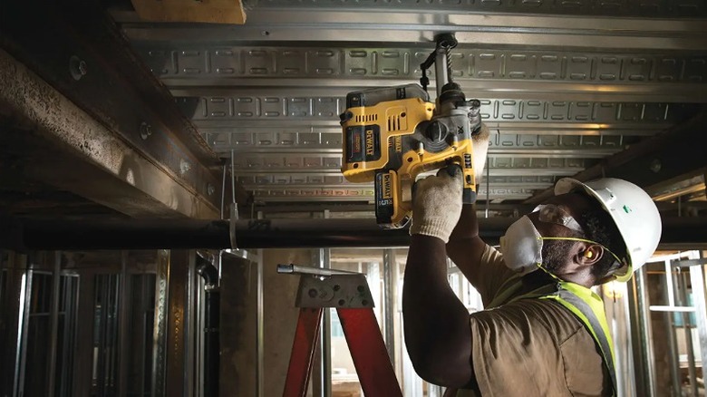 Using rotary hammer drill on a ceiling