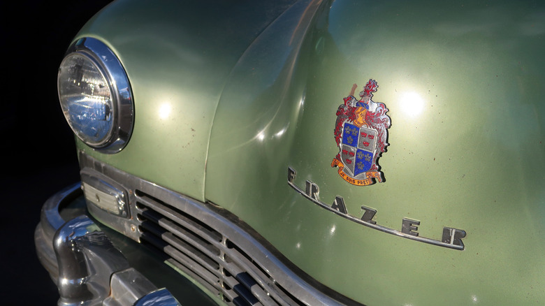 A closeup of the hood of a Kaiser Frazer Motors car