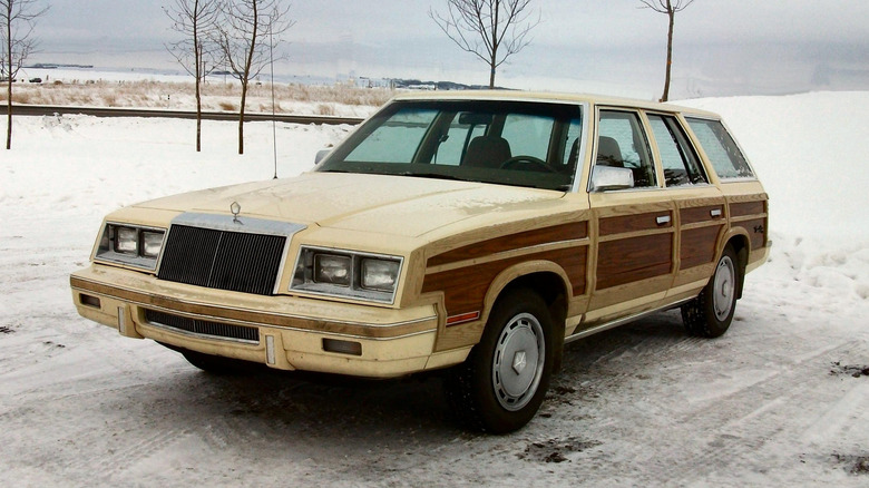 1982 Chrysler LeBaron Town & Country Station Wagon parked on a snowy road