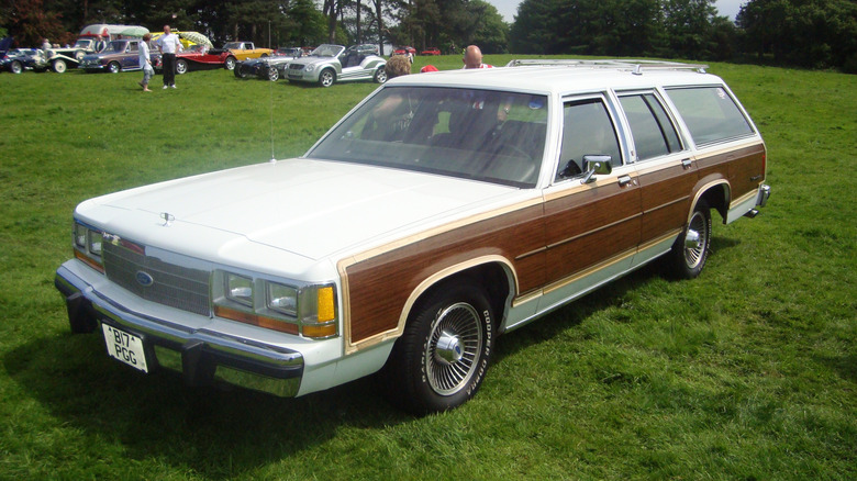 Ford LTD Crown Victoria parked on the grass at an outdoor car show