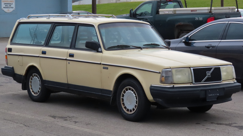 1989 Volvo 240 DL Wagon in a gaudy off-white color, parked in a parking lot