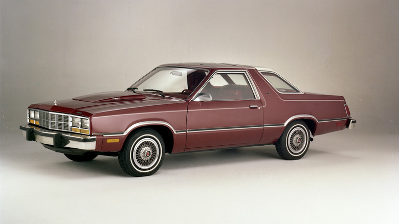 Red 1980 Ford Fairmont Futura turbocharged coupe seen from left front