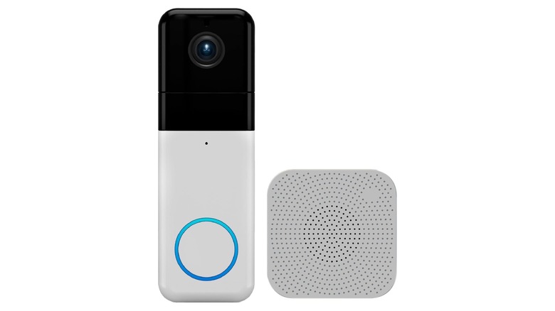 Black and white doorbell camera with small detached white speaker