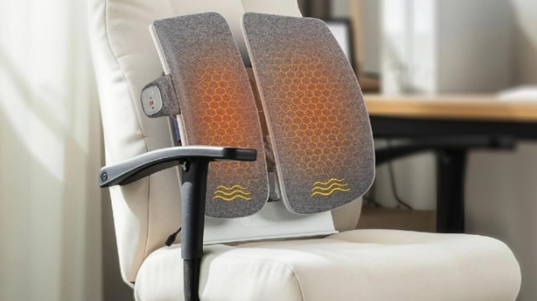The COMFIER Heated Lumbat Support Pillow mounted to an office chair