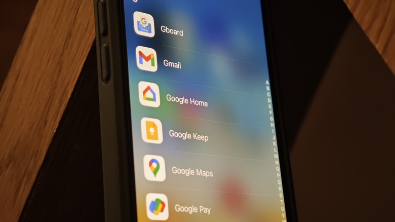 An iPhone with the Google Home app in the app library