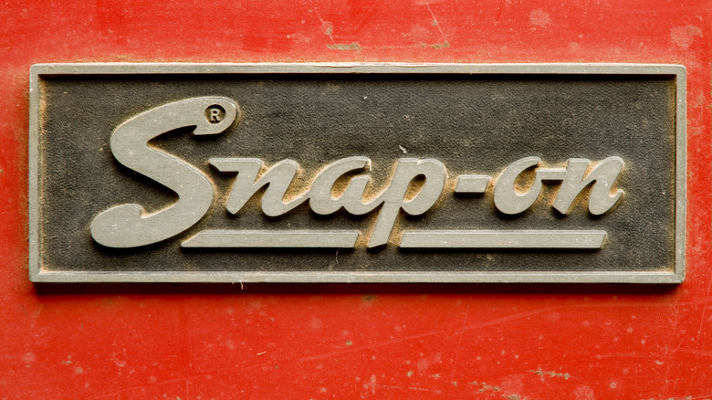 Snap-on logo on a metal sheet.
