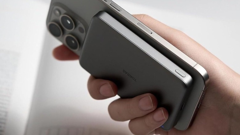 torras power bank on back of iphone