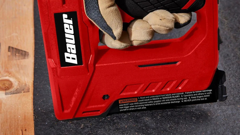 Closeup of the Bauer 4V stapler in use.