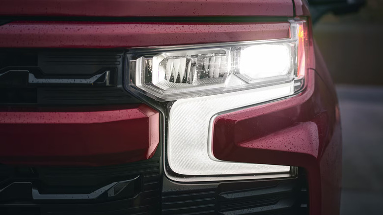 A close-up of the Chevy Silverado's left headlight